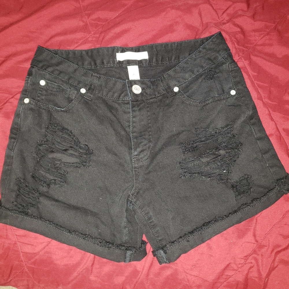 Ripped black shorts
